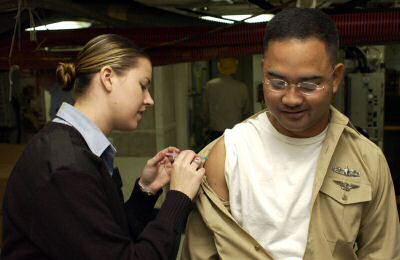 Navy seaman getting his flu shot